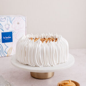 Torta de brownie, nutella, manjar y avellanas